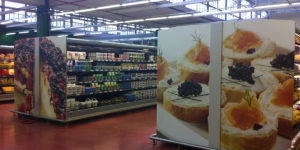 ASSSO Magliana personalizzazioni fianchi frigoriferi con stampe digiltali adesive ad alta risoluzione sagomate sul posto
